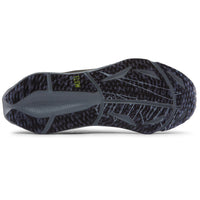 Close-up of a black and gray athletic shoe sole on a white background