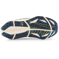 Close-up of a running shoe sole with blue and white design on a white background