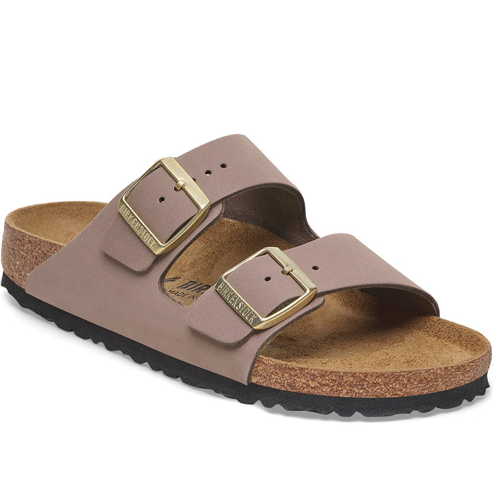 Quarter turn Women's Birkenstock Footwear style name Arizona Nubuck Narrow in color Faded Purple Nubuck. Sku: 1029428
