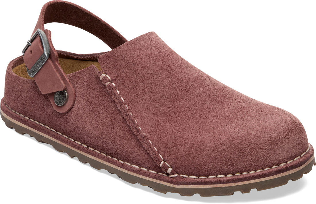 A single slip-on clog-style shoe in dusty rose suede with a strap and buckle closure, shown on a plain white background.