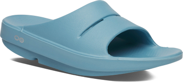 Quarter turn view Women's Oofos Footwear style name Ooahh Slide in color Ocean Blue. Sku: 1100OCEBLU