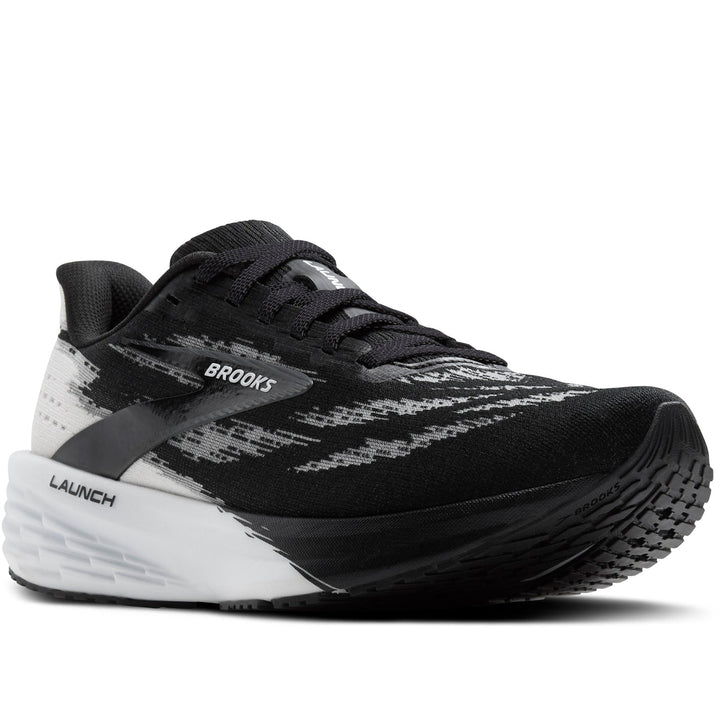 Quarter turn Men's Brooks Footwear style name Launch 11 Wide in color Black/ White. Sku: 110450-2E087