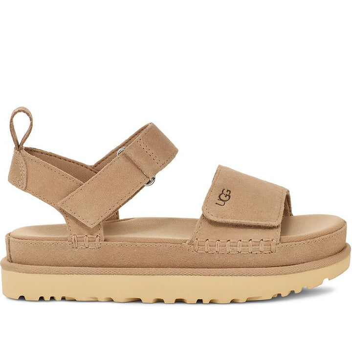 Quarter turn Women's UGG Footwear style name Goldenstar in color Sand. Sku: 1136783-SAN