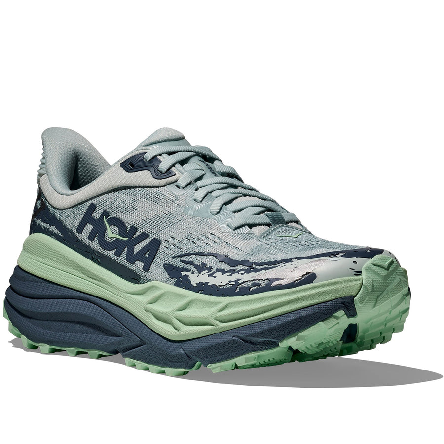 Quarter turn view Women's Hoka Footwear style name Stinson 7 in color Droplet/ Thunder Cloud. Sku: 1141531-DTH
