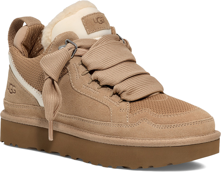 Quarter turn view Women's UGG Footwear style name Lowmel in color SAND. Sku: 1144032-SAN