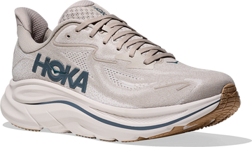 Quarter turn view Men's HOKA Footwear style name Clifton 10 in color Putty/ Grout. Sku: 1162030-PTYG
