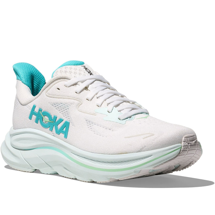 Quarter turn view Women's Hoka Footwear style name Clifton 10 in color White/ Cielo Blue. Sku: 1162031-WTCL