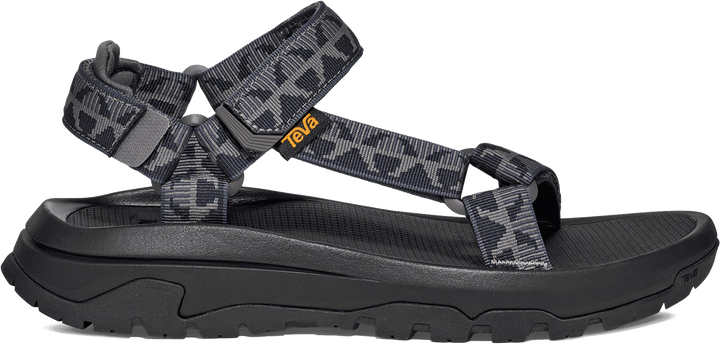 Quarter turn view Men's Teva Footwear style name Hurricane XLT3 in color Criss Cross Navy. Sku: 1173670-CSSN