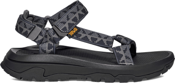 Quarter turn view Men's Teva Footwear style name Hurricane XLT3 in color Criss Cross Navy. Sku: 1173670-CSSN