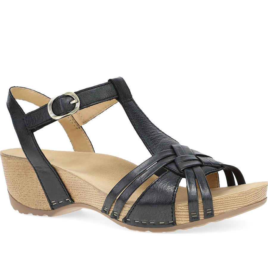 Quarter turn Women's Dansko Footwear style name Tia in color Black Burnished. Sku: 1715101600
