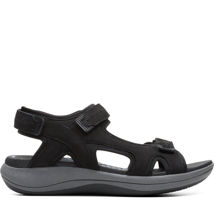 Quarter turn Women's Clarks Footwear style name Mira Free in color Black Nubuck. Sku: 26182075
