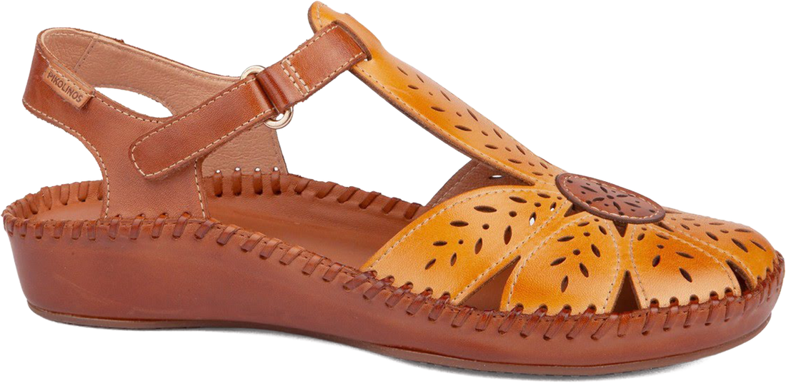 Brown sandal with cut-out design on a white background