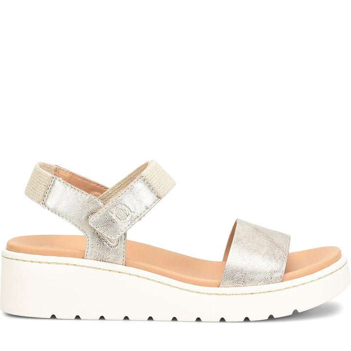Quarter turn Women's BORN Footwear style name Kyla in color Light Gold. Sku: BR0072330