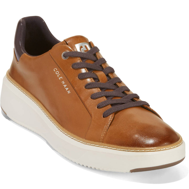 Quarter turn Men's Cole Haan Footwear style name Grandpro Topspin in color Brit Tan. Sku: C34229