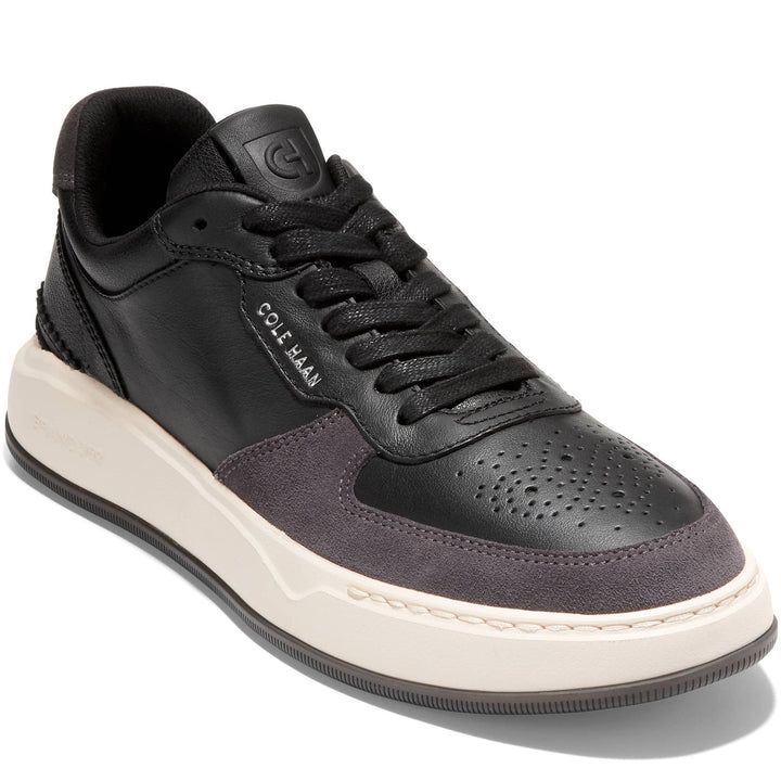 Quarter turn Men's Cole Haan Footwear style name Grandpro Crossover in color Black. Sku: C34905