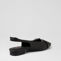 A single black leather slingback sandal with a low block heel and pointed toe, shown from a side-rear angle on a light gray background.