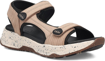 Quarter turn view Women's Taos Footwear style name Super Side in color Natural. Sku: SPS-14161NATE