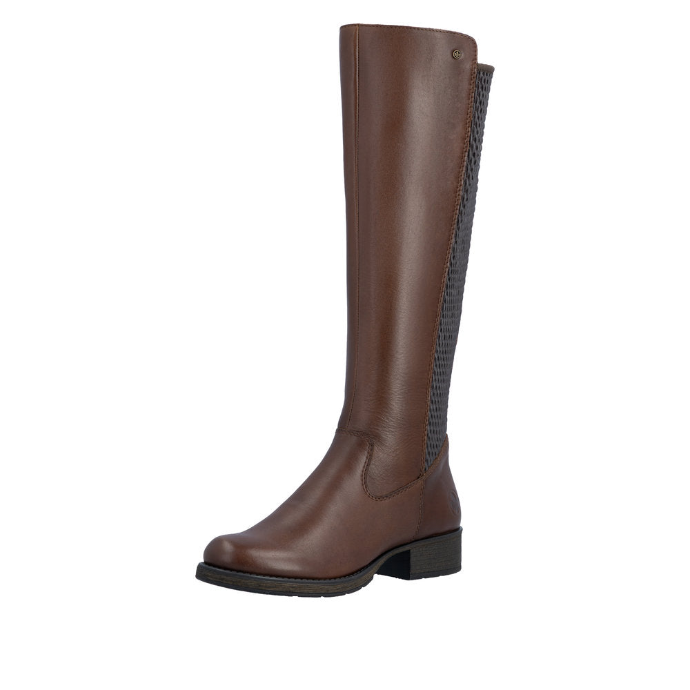 Brown knee-high boot with a patterned back on a white background