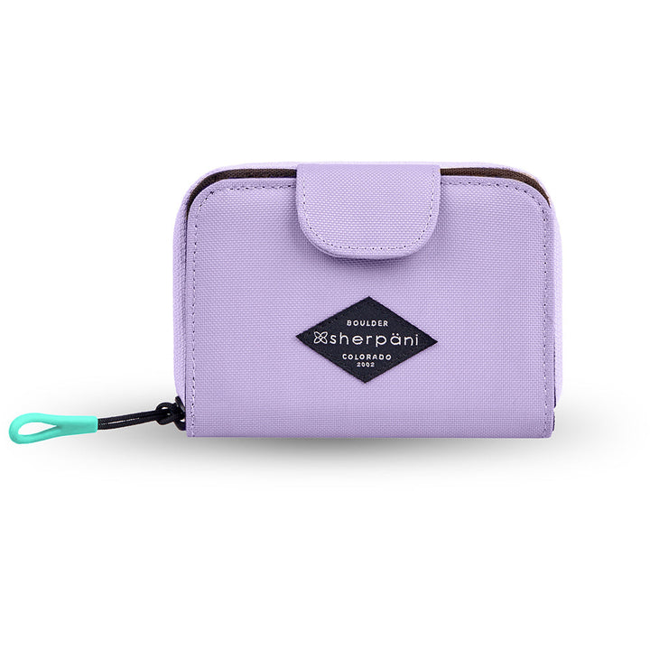 Quarter view Women's Sherpani Hand Bag style name Barcelona Zip Wallet in color Lavender. Sku: 23-BARCE04110