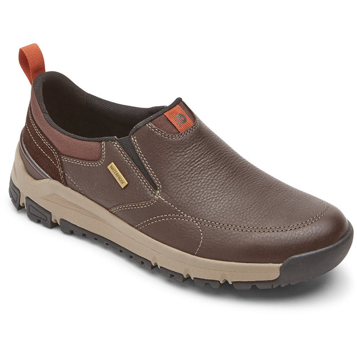 Quarter view Men's Dunham Footwear style name Glastonbury Slip-On color Brown Leather. Sku: CI5609