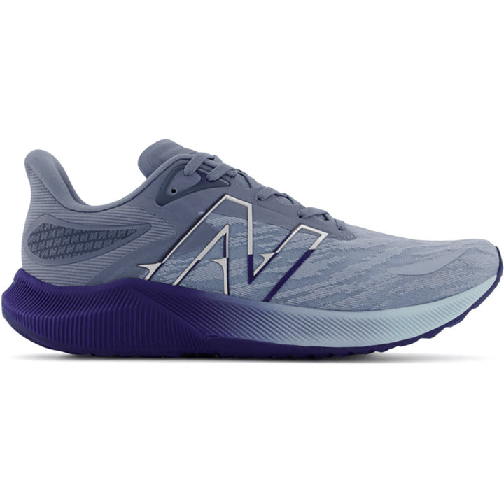 Quarter view Men's New Balance Footwear style name Fuel Cell Propel V3 color Dusk Blue/Bleach Blue/Victory Blue. Sku: MFCPRCG3