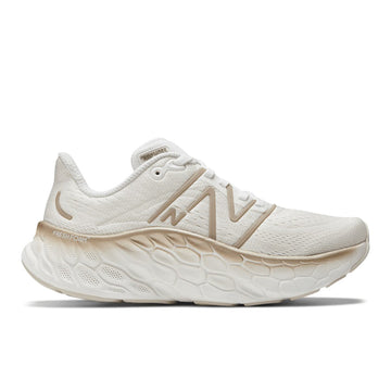 Quarter view Women's New Balance Footwear style name More V4 Wide in color White Gold Metalic. Sku: WMORCW4-1D